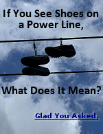Look! Up in the sky! Is it a bird? Is it a chain? No, waitit's a pair of shoes on a power line. But what are they doing there?